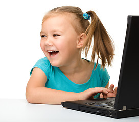 Image showing Little girl with laptop