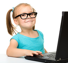 Image showing Little girl with laptop