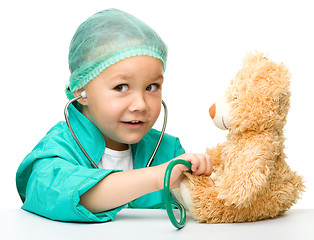 Image showing Little girl is playing doctor with stethoscope