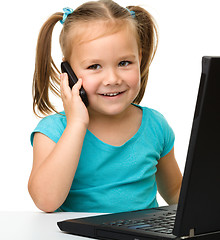 Image showing Little girl with laptop