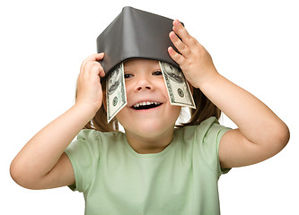 Image showing Cute little girl with paper money - dollars