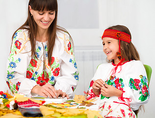 Image showing Mother and child in Ukrainian national cloth