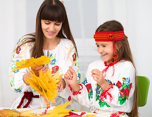 Image showing Mother and child in Ukrainian national cloth