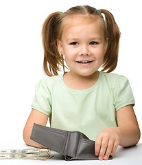 Image showing Cute little girl with paper money - dollars