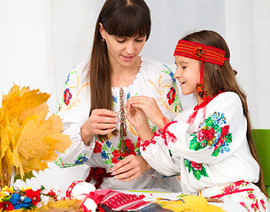 Image showing Mother and child in Ukrainian national cloth