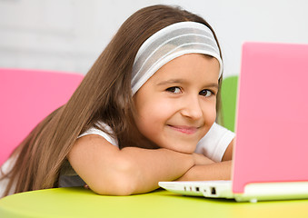 Image showing Little girl with laptop