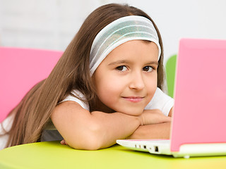 Image showing Little girl with laptop