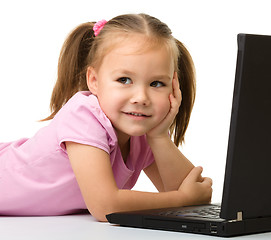 Image showing Little girl with laptop