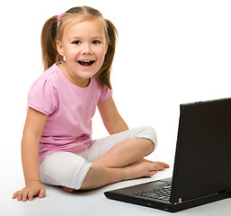 Image showing Little girl with laptop