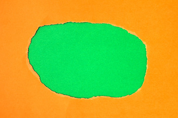 Image showing Red torn paper with green space for text 