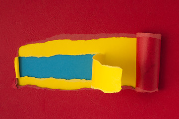 Image showing Red torn paper with blue space for text