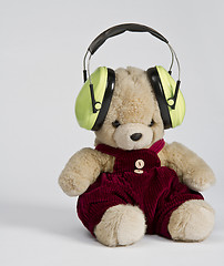 Image showing teddy bear with ear protection