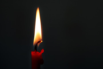 Image showing burning red candle