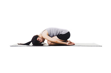 Image showing Chinese woman doing yoga.