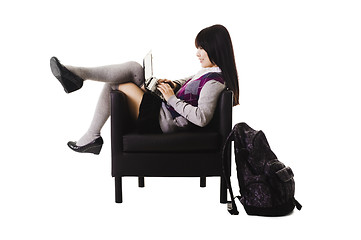 Image showing Chinese student working on laptop.