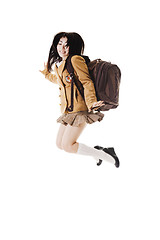 Image showing Chinese school girl jumping in the air.