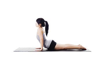 Image showing Chinese woman doing yoga.