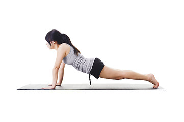 Image showing Chinese woman doing yoga.