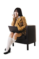 Image showing Chinese school girl working on a laptop.