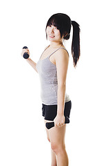 Image showing Chinese girl lifting hand weights.