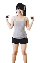 Image showing Chinese girl lifting hand weights.