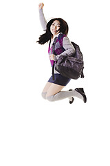 Image showing Chinese school girl jumping into air.