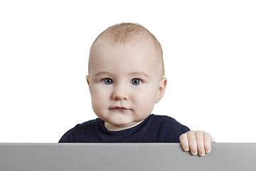 Image showing young child holding sign