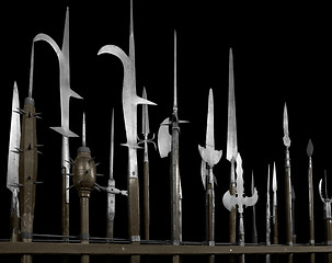 Image showing halberds in black back