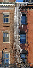 Image showing icicles on a house facade