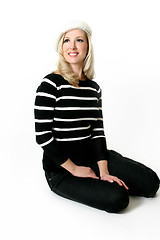 Image showing Woman sitting on floor