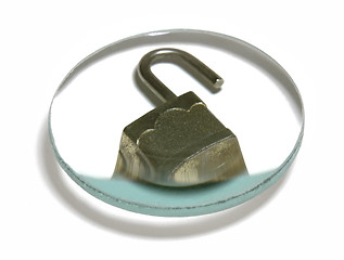 Image showing open padlock under glass lens