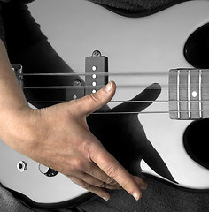 Image showing hand on bass guitar