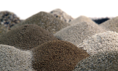 Image showing various brown toned sand piles together