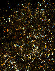 Image showing golden metallic loops