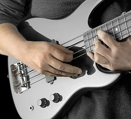 Image showing hand on bass guitar