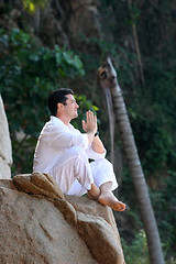 Image showing Man meditating in the forest