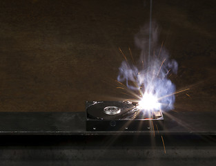 Image showing welding a hard disk