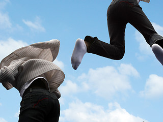 Image showing Flying children high in the air