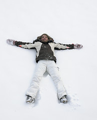 Image showing girl having fun in the snow