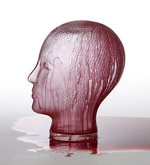 Image showing bloody glass head