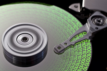 Image showing hard disk and symbolic data