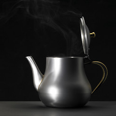 Image showing metallic tea pot sideways