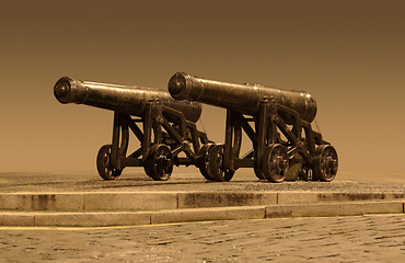 Image showing outside scenery with nostalgic cannons