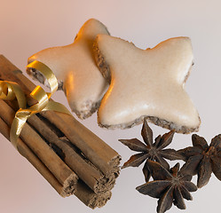 Image showing christmas theme with cinnamon sticks, stars and spice
