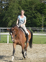 Image showing girl while horse riding