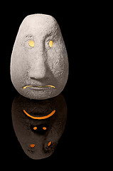 Image showing illuminated sad ceramic head