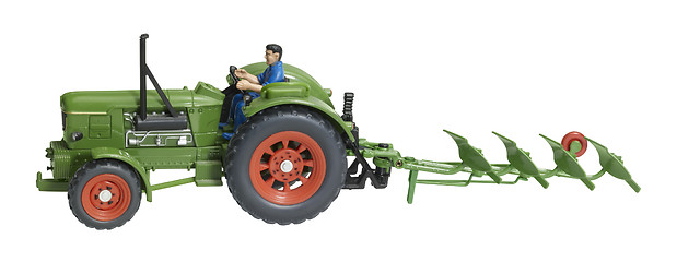 Image showing nostalgic toy tractor with plowshare