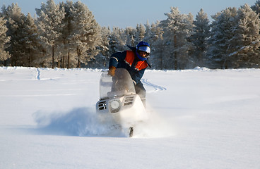 Image showing Snowmobile at full speed