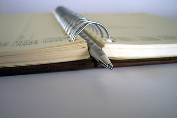 Image showing pen in the middle of notebook