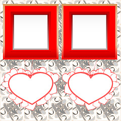 Image showing two blank instant photo frames with heart shapes on wood